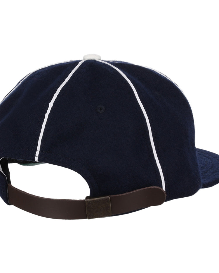 The EFF Indianapolis Indians 1935 Vintage Ballcap in navy blue is shown from the back, with white seams, a dark brown adjustable strap, and a metal clasp.