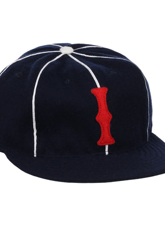 The EFF Indianapolis Indians 1935 Vintage Ballcap is a navy blue cap with white seam piping and a red vertical I patch, inspired by the original classic design.