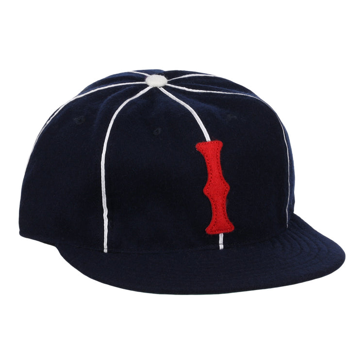 The EFF Indianapolis Indians 1935 Vintage Ballcap is a navy blue cap with white seam piping and a red vertical I patch, inspired by the original classic design.