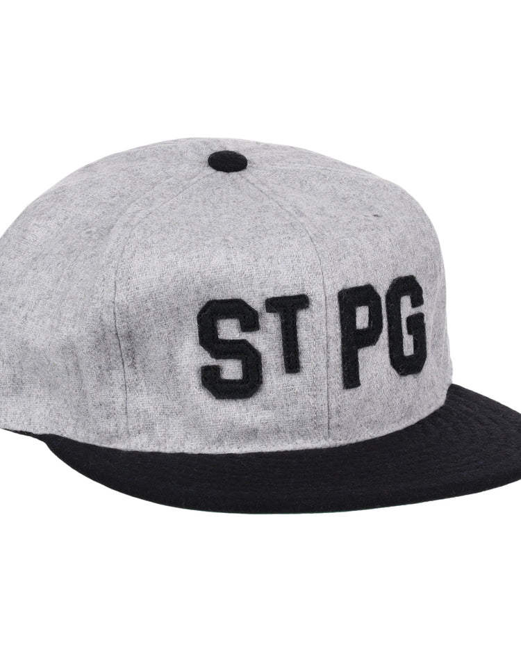 The St. Paul Gophers 1909 Vintage Ballcap by Ebbets Field Flannels features a gray crown, black brim, and bold black “ST PG” letters—an authentic reproduction inspired by the classic 1909 design.