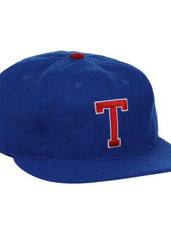 The EFF Tacoma Cubs 1969 Vintage Ballcap features royal blue fabric, a red and white embroidered T, and a small red top button, inspired by the classic Tacoma Cubs design.