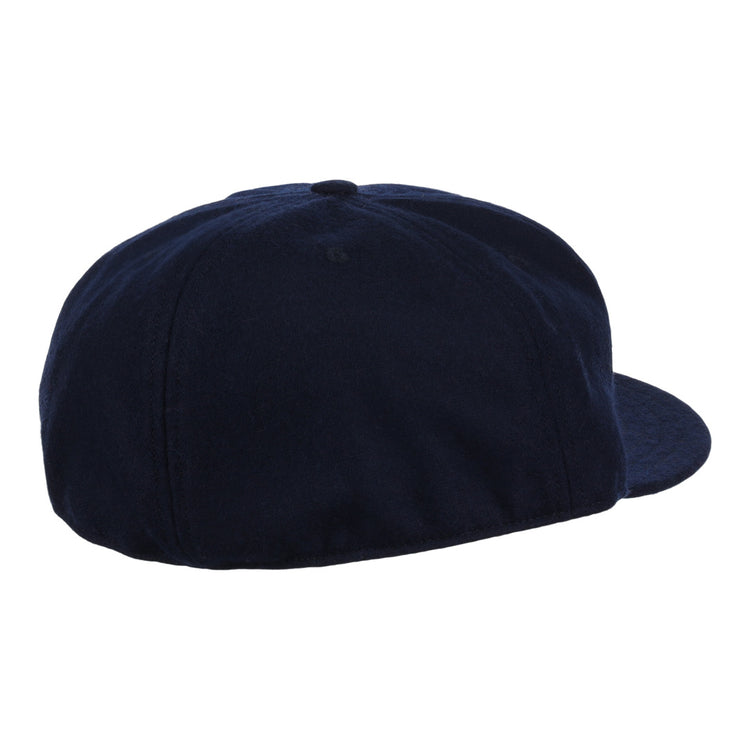 The EFF Twin Falls Cowboys 1947 Vintage Ballcap in dark navy is shown from the back and side, featuring a rounded crown and flat brim. Made from genuine wool baseball cloth and displayed against a plain white background.