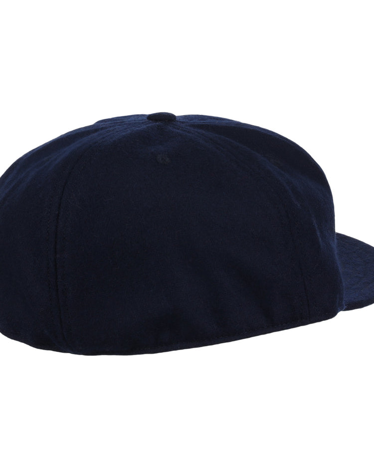The EFF Twin Falls Cowboys 1947 Vintage Ballcap in dark navy is shown from the back and side, featuring a rounded crown and flat brim. Made from genuine wool baseball cloth and displayed against a plain white background.