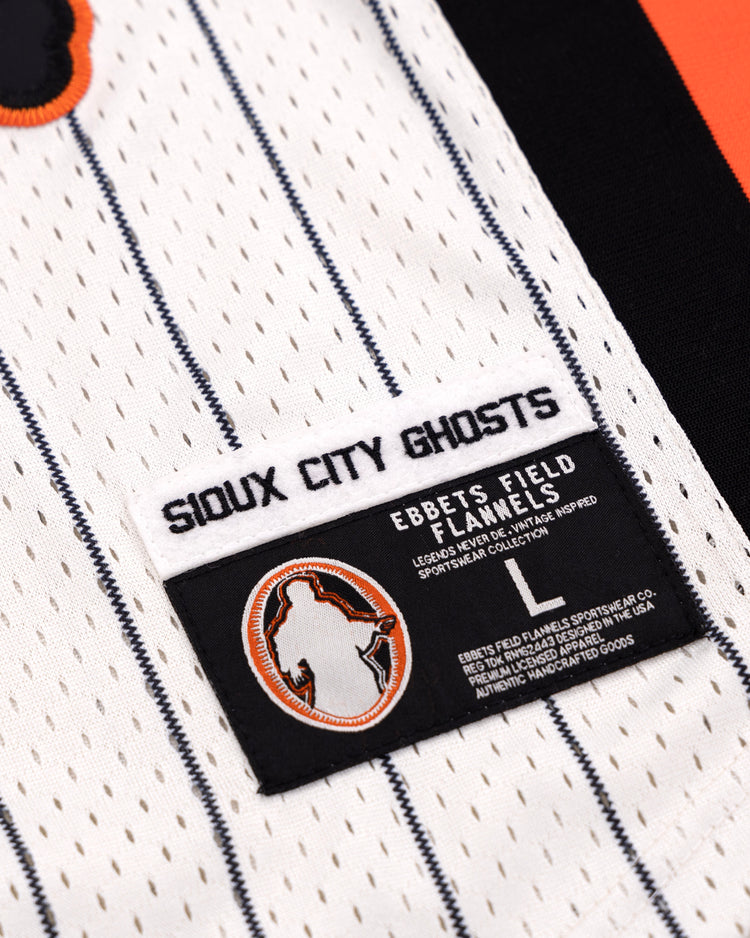 A close-up of the Sioux City Ghosts EFF Pinstripe Button Down Jersey by EFF, featuring a white pinstripe design and a black-and-orange patch with a ghost silhouette.