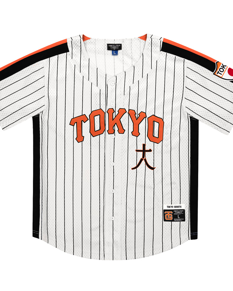 The EFF Tokyo Giants Pinstripe Button Down Jersey features black pinstripes, bold orange TOKYO lettering on the chest, black and orange sleeve stripes, and a left-sleeve Tokyo Giants patch with a baseball and TOKYO.
