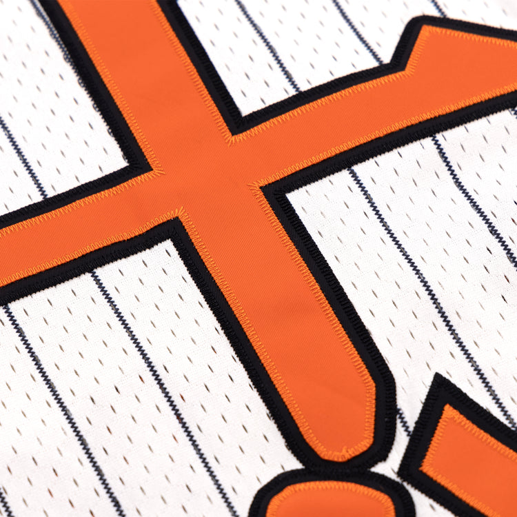 A close-up of the EFF Tokyo Giants EFF Pinstripe Button Down Jersey, inspired by the legendary team and its legacy in Black baseball history.