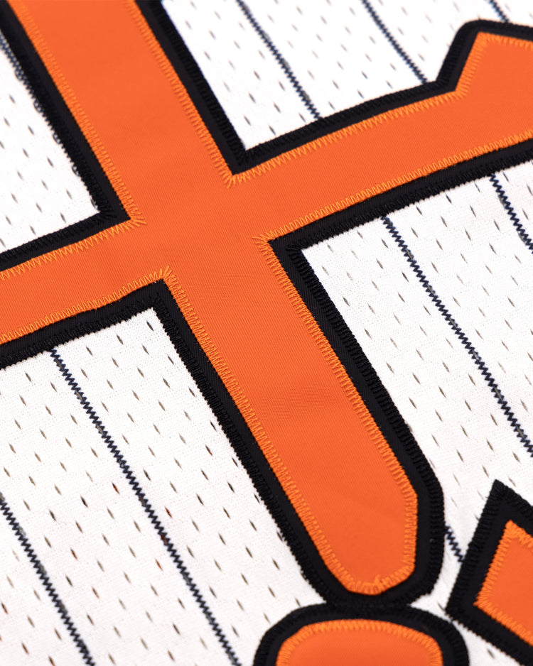 A close-up of the EFF Tokyo Giants EFF Pinstripe Button Down Jersey, inspired by the legendary team and its legacy in Black baseball history.