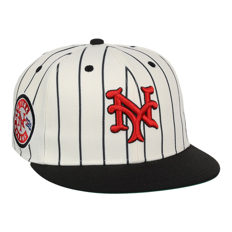 The EFF New York Cubans NLB Pinstripe Fitted Ballcap features white fabric with black pinstripes, a black brim, red interlocking NY logo, and a side patch—honoring the legacy of Black baseball and the Negro National League.