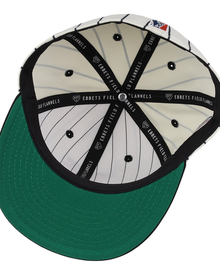 The EFF New York Cubans NLB Pinstripe Fitted Ballcap features a black-and-white pinstripe lining, a black sweatband with EBBETS FIELD FLANNELS text, a green underbrim honoring the Negro National League, and an MLB logo on the interior back panel.