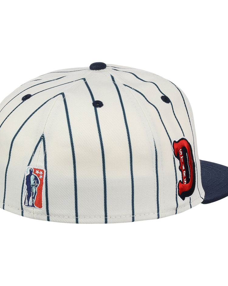 The EFF Detroit Stars NLB Pinstripe Fitted Ballcap features white fabric with dark blue pinstripes, a navy blue brim, a red and black Detroit Stars D logo, and a small embroidered baseball figure on the side.