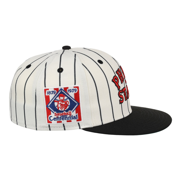 The EFF Philadelphia Stars NLB Pinstripe Fitted Ballcap is white with black pinstripes, a black brim, red embroidered text, and a blue/red Baseball Centennial 1839-1939 patch honoring Negro National League history.