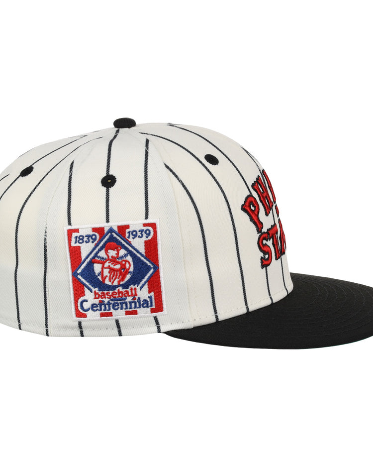 The EFF Philadelphia Stars NLB Pinstripe Fitted Ballcap is white with black pinstripes, a black brim, red embroidered text, and a blue/red Baseball Centennial 1839-1939 patch honoring Negro National League history.