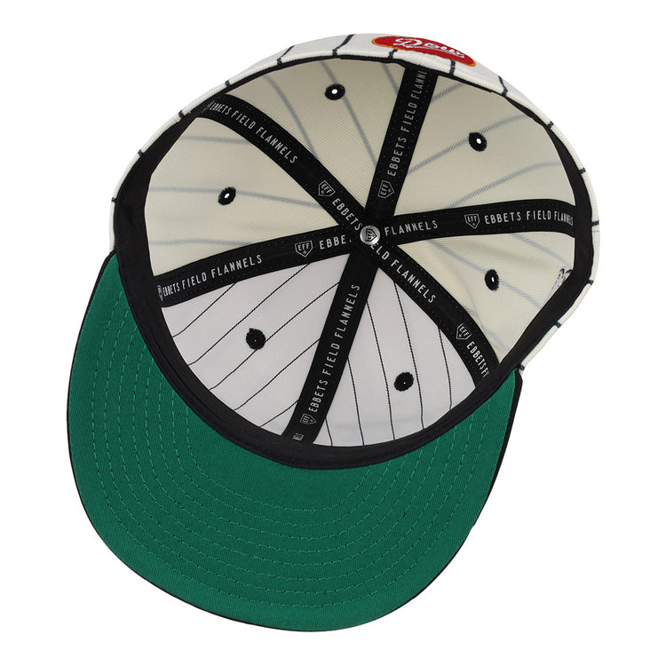 The Montreal Black Panthers NLB Pinstripe Fitted Ballcap by EFF features a green brim, white and black pinstriped lining, Ebbets Field Flannels bands, a red tag, and black ventilation holes.