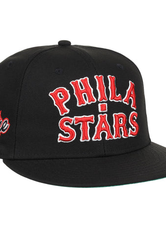 The EFF Cultural Excellence x Philadelphia Stars Fitted Ballcap features PHILA STARS in bold red and white, a Culture patch on the side, and classic streetwear style inspired by Negro League Baseball.
