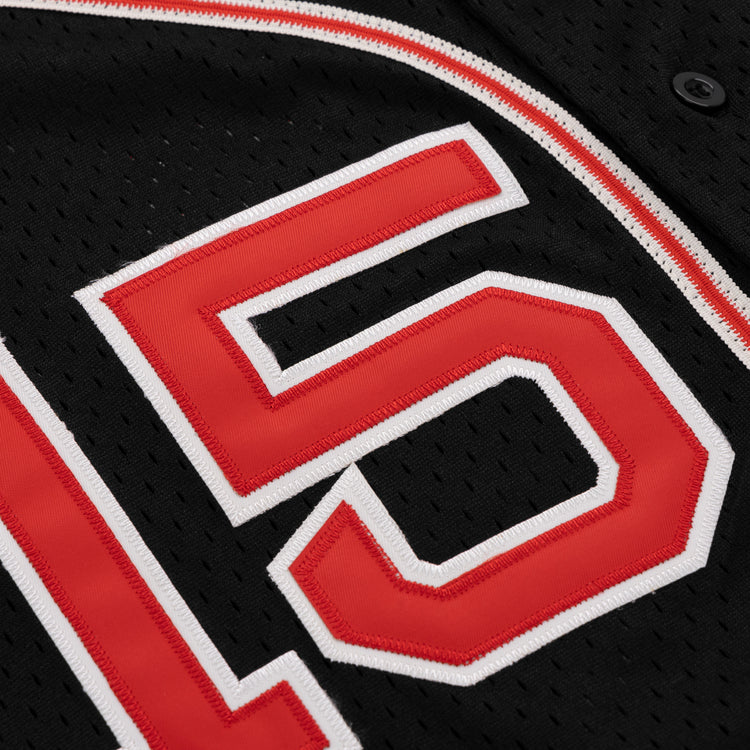 Close-up of the EFF Cultural Excellence x Philadelphia Stars Button Down Jersey, featuring bold red 16 numerals outlined in white on breathable black mesh fabric with perforations for style and comfort.