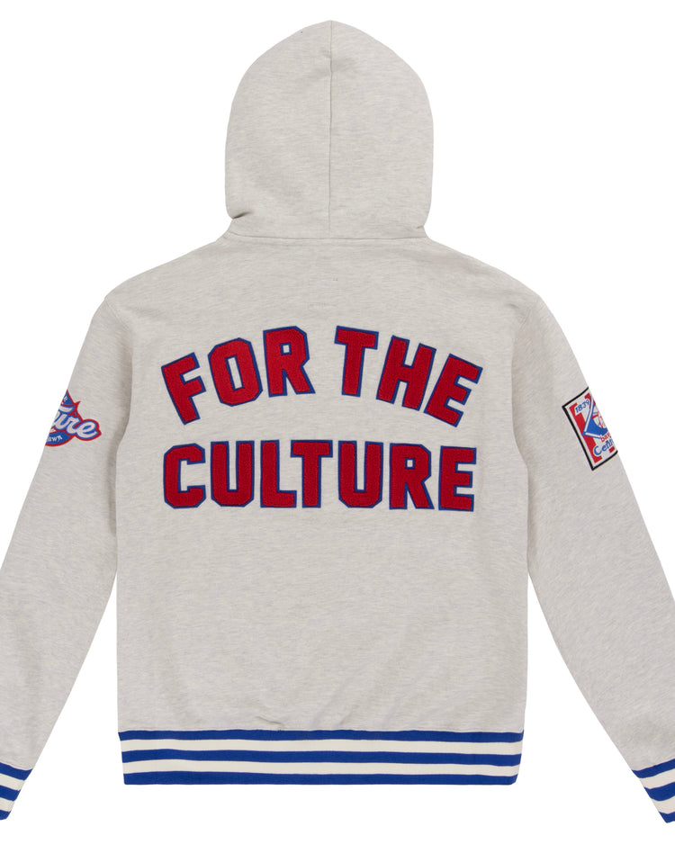 The EFF Cultural Excellence x Philadelphia Stars French Terry Hooded Sweatshirt features a light gray body, blue and white striped cuffs and hem, FOR THE CULTURE emblazoned on the back, and a colorful Negro League Baseball patch on the right sleeve.