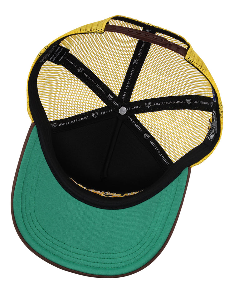 A top-down view of the EFF Walla Walla Padres MiLB Vintage Foam Trucker, showing its green brim, brown edge, yellow mesh sides, and crisscrossed branded black interior straps.