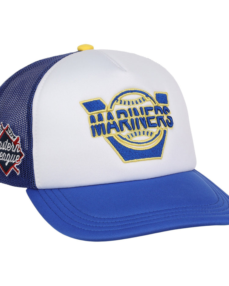 The EFF Vermont Mariners EFF MiLB Vintage Foam Trucker is a white and blue snapback with a yellow and blue Mariners logo, red Eastern League patch, mesh back, and blue bill—ideal for collectors of the Vintage Minor League collection.