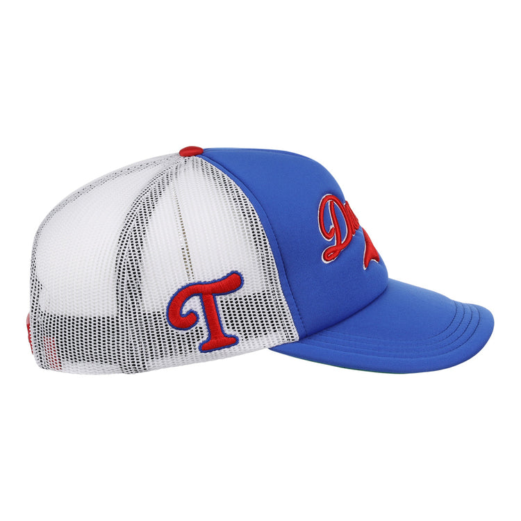 The EFF Tulsa Drillers EFF MiLB Vintage Foam Trucker is a blue and white mesh hat with a red and blue embroidered side T and bold red script on the front, shown from the side.