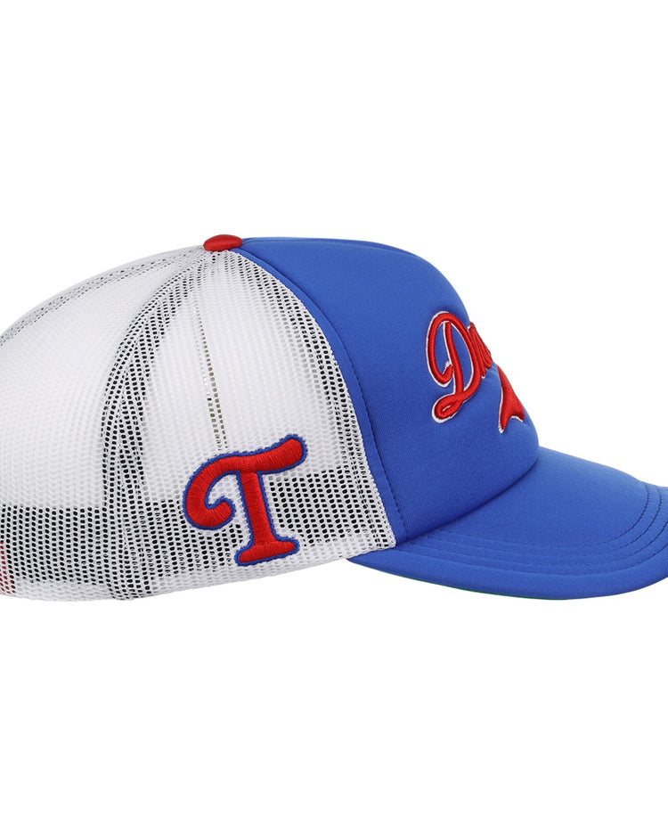 The EFF Tulsa Drillers EFF MiLB Vintage Foam Trucker is a blue and white mesh hat with a red and blue embroidered side T and bold red script on the front, shown from the side.