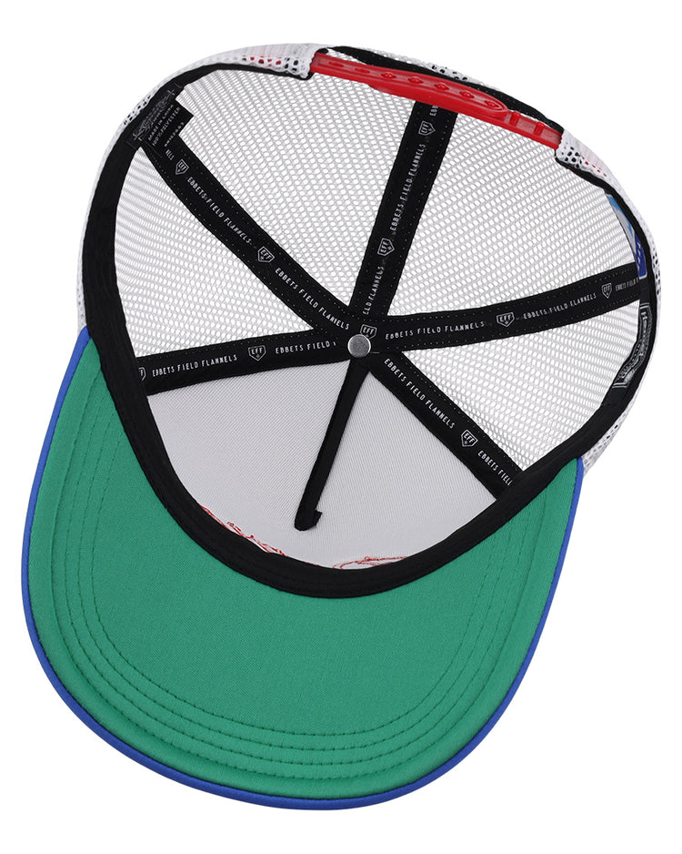 The image shows the inside of an EFF Tulsa Drillers EFF MiLB Vintage Foam Trucker, featuring a green brim, white mesh panels, black bands with white text and hearts, and blue trim along the edge.