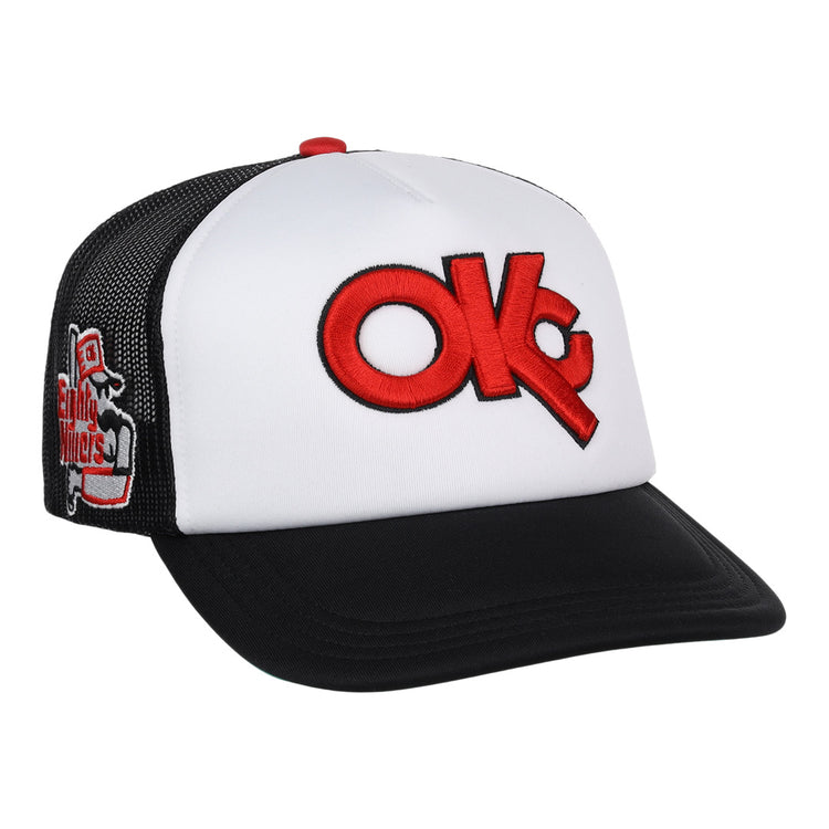 The Oklahoma City 89ers EFF MiLB Vintage Foam Trucker by EFF is a white and black snapback hat with a red OKC logo on the front and a small “Chilly Wolves” graphic embroidered on the side mesh panel, inspired by vintage minor league designs.