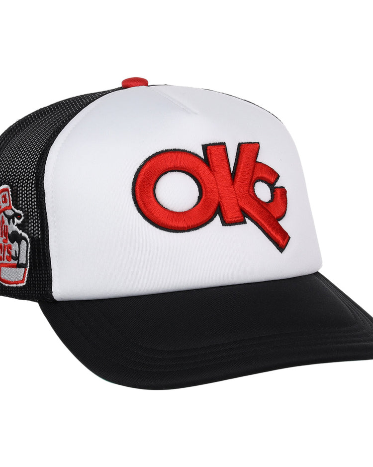 The Oklahoma City 89ers EFF MiLB Vintage Foam Trucker by EFF is a white and black snapback hat with a red OKC logo on the front and a small “Chilly Wolves” graphic embroidered on the side mesh panel, inspired by vintage minor league designs.
