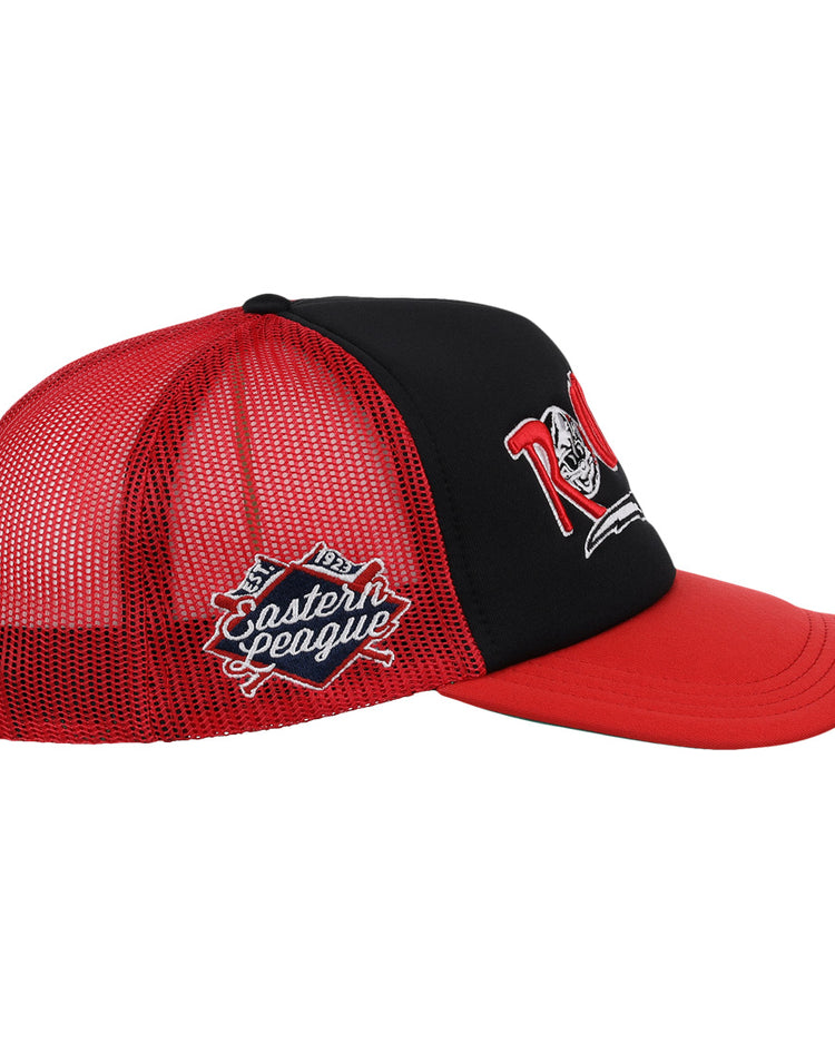 The EFF New Britain Rock Cats MiLB Vintage Foam Trucker is a red and black cap with a baseball-themed front logo, Eastern League embroidered on the side, curved brim, and mesh back for ventilation.