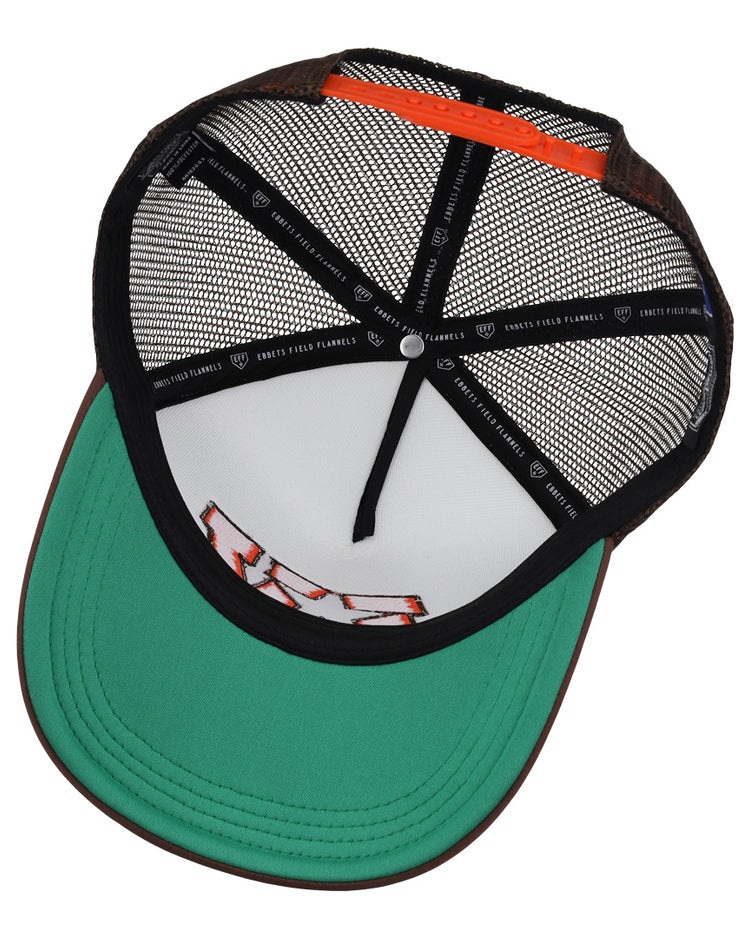 A close-up of the Las Vegas Stars EFF MiLB Vintage Foam Trucker by EFF, showing a green brim, orange accent, black mesh back, and snapback with black interior taping featuring white logos and “Ghosts Follow Flannel” text.