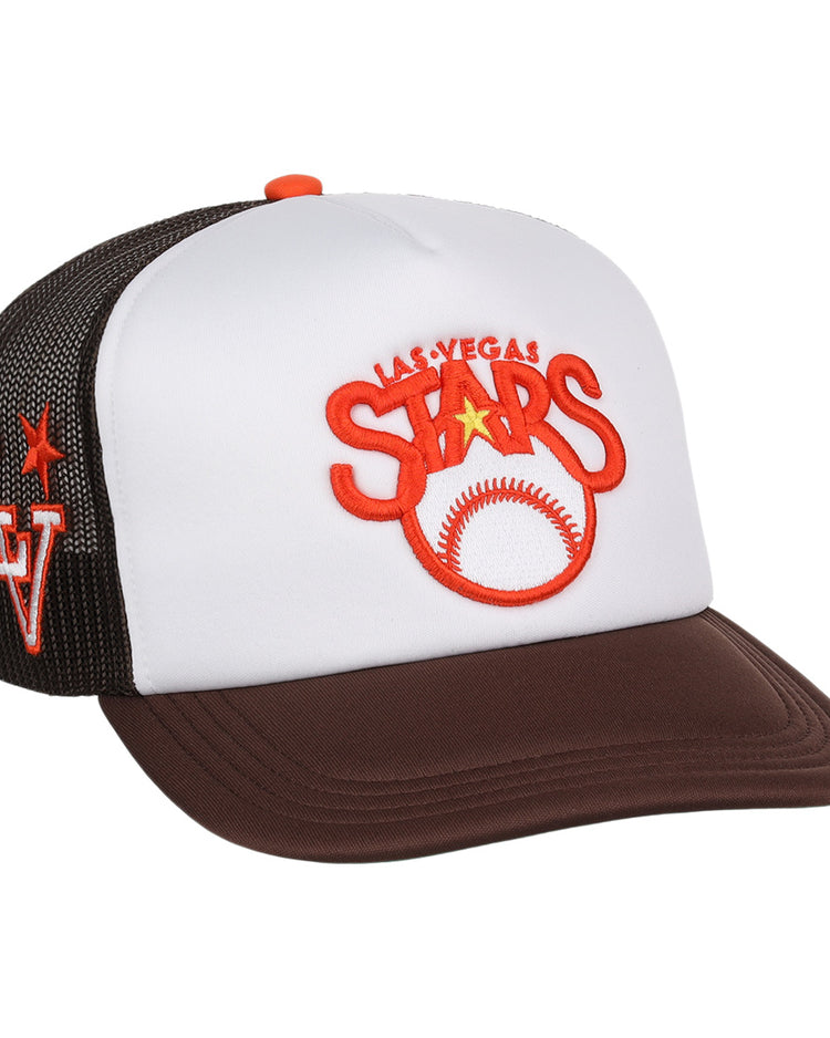 The EFF Las Vegas Stars EFF MiLB Vintage Foam Trucker - Logo is a white and brown retro baseball hat with LAS VEGAS STARS and a baseball embroidered in orange and red on the front, plus LV with a star on the mesh side panel.