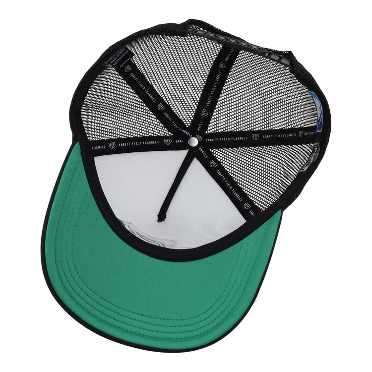 An inside view of the Las Vegas Area 51s EFF MiLB Vintage Foam Trucker by EFF, showing its green brim underside, black mesh panels, and black sweatband with white text.