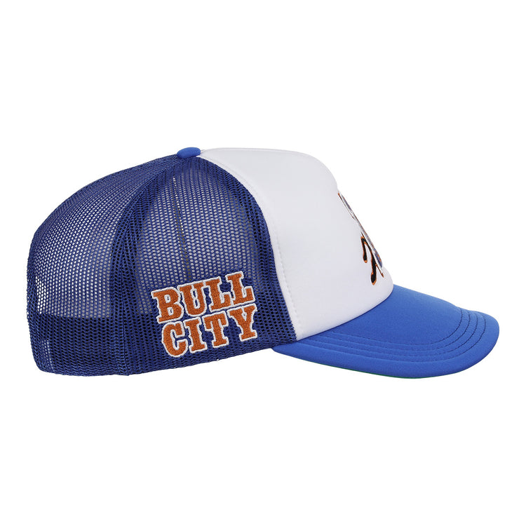 The EFF Durham Bulls EFF MiLB Vintage Foam Trucker features solid blue and white on the front, a blue and white mesh back, and BULL CITY in orange on the side panel, inspired by vintage Minor League style.