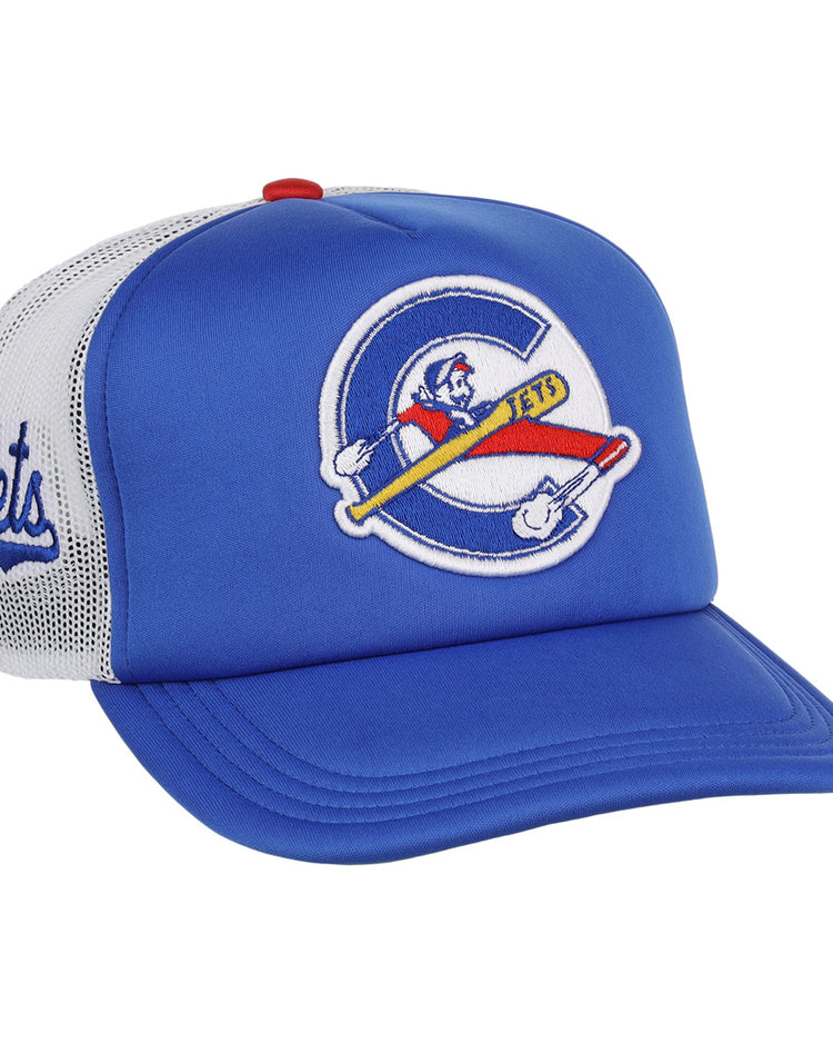 The EFF Columbus Jets MiLB Vintage Foam Trucker is a blue and white cap with a large hockey-inspired Chicago Cubs-style logo on the front and Jets in script on the mesh side panel, echoing classic Minor League style.