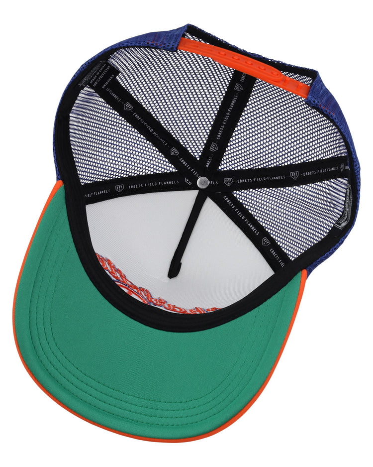 The image shows the inside of an EFF Charlotte Orioles EFF MiLB Vintage Foam Trucker hat, with a green brim, orange trim, and blue top. The interior features black mesh lining and seam tape with white text and symbols.