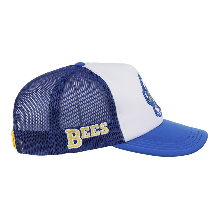 The Burlington Bees EFF MiLB Vintage Foam Trucker by EFF is a blue and white mesh hat with BEES embroidered in yellow on the side and a blue brim, inspired by classic Minor League style.
