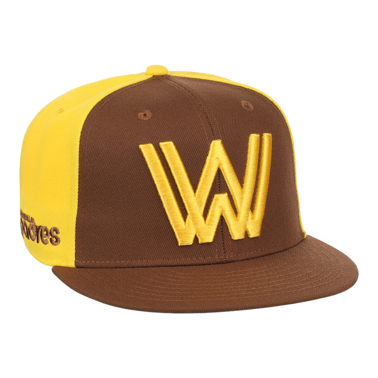 The Ebbets Field Flannels Walla Walla Padres EFF MiLB Vintage Snapback features a brown and yellow design, large yellow W logo front, Padres embroidery on the side, and classic Minor League inspiration.