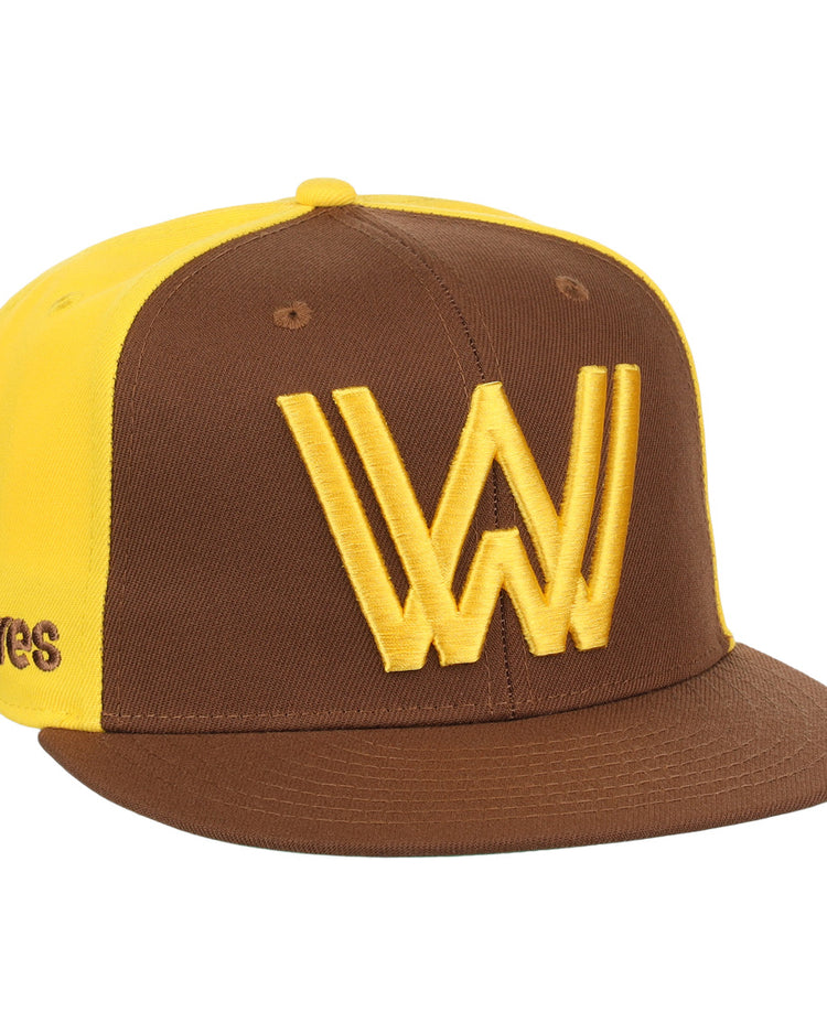 The Ebbets Field Flannels Walla Walla Padres EFF MiLB Vintage Snapback features a brown and yellow design, large yellow W logo front, Padres embroidery on the side, and classic Minor League inspiration.