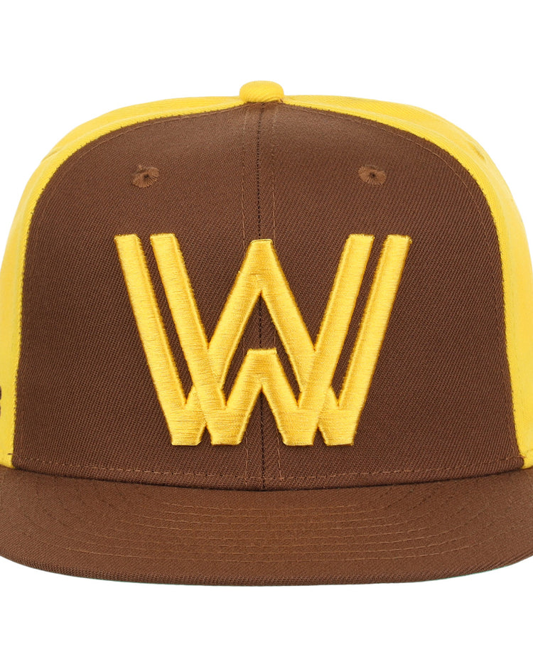 The Ebbets Field Flannels Walla Walla Padres EFF MiLB Vintage Snapback is a brown and yellow adjustable hat inspired by classic Minor League style.