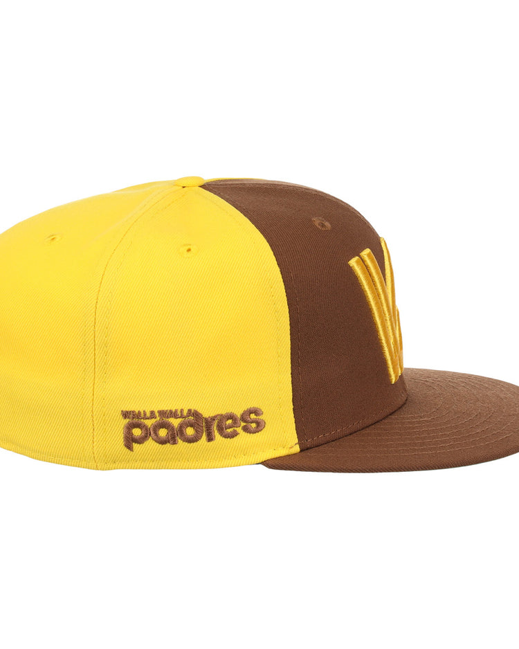 The Ebbets Field Flannels Walla Walla Padres EFF MiLB Vintage Snapback is a brown and yellow adjustable cap with alternating panels, a large yellow W on the front, and padres embroidered on the side.