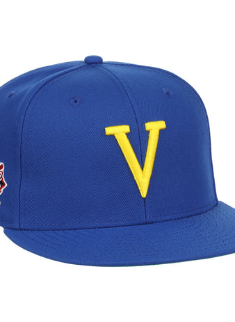 The Vermont Mariners EFF MiLB Vintage Snapback by Ebbets Field Flannels features a blue adjustable cap with a bold yellow V front and an Eastern League patch—perfect for Vermont Mariners fans and vintage collectors.