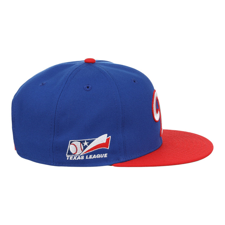 The Ebbets Field Flannels Tulsa Drillers EFF MiLB Vintage Snapback features a blue crown, red brim, ventilation holes, a red and white embroidered front design, and the Texas League logo above TEXAS LEAGUE on the side.