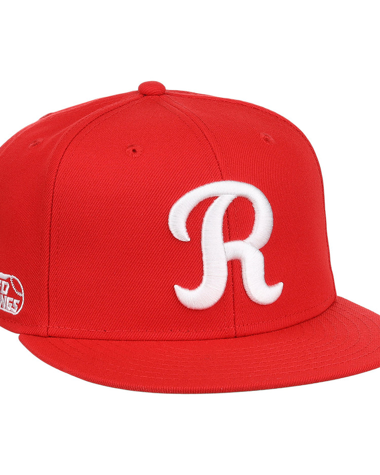 The Ebbets Field Flannels Rochester Red Wings EFF MiLB Vintage Snapback is a bright red cap with a flat brim, featuring a white “R” on the front and a side patch, honoring Cal Ripken Jr. as part of the Vintage Minor League collection.