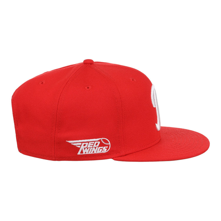 The Ebbets Field Flannels Rochester Red Wings EFF MiLB Vintage Snapback is a red flat-brim cap with a white team logo and wing graphic on the side, shown against a plain white background.
