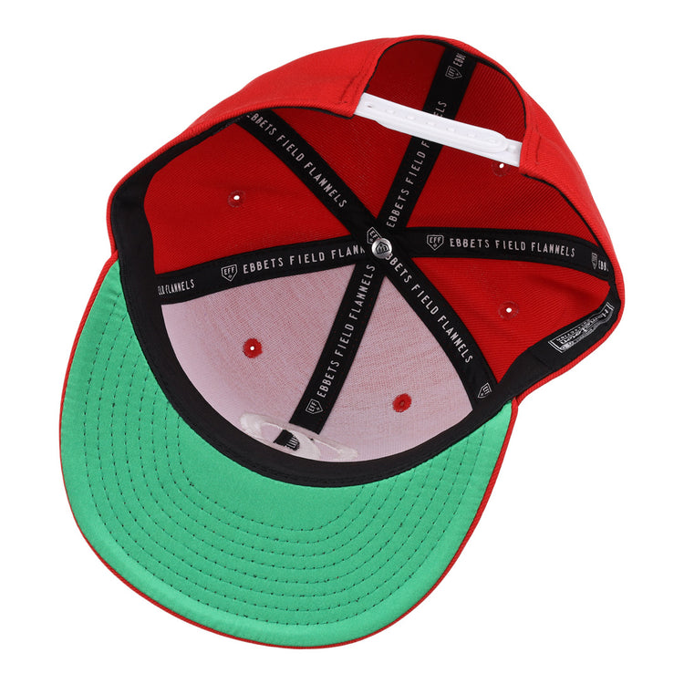 The Rochester Red Wings EFF MiLB Vintage Snapback by Ebbets Field Flannels features red and green colors, a green underbrim, and a black inner band labeled with the brand—celebrating team heritage.