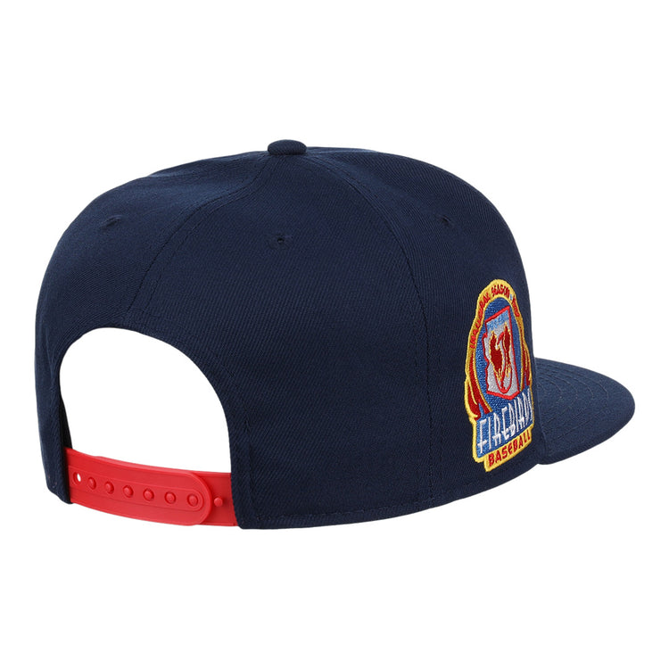 The Ebbets Field Flannels Phoenix Firebirds EFF MiLB Vintage Snapback is a navy cap with a red adjustable strap, featuring a colorful embroidered FIREMAN patch on the side for classic Minor League style.