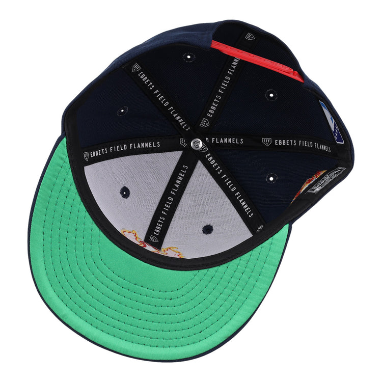 The Phoenix Firebirds EFF MiLB Vintage Snapback by Ebbets Field Flannels features a green brim, black and white interior with the brand’s logo on the inner bands, ventilation holes, and classic details from their Vintage Minor League collection.