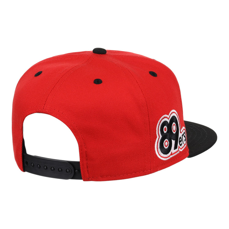 The Ebbets Field Flannels Oklahoma City 89ers EFF MiLB Vintage Snapback features a red crown, black brim and strap, and a side patch with bold black and white “89 ers” text.