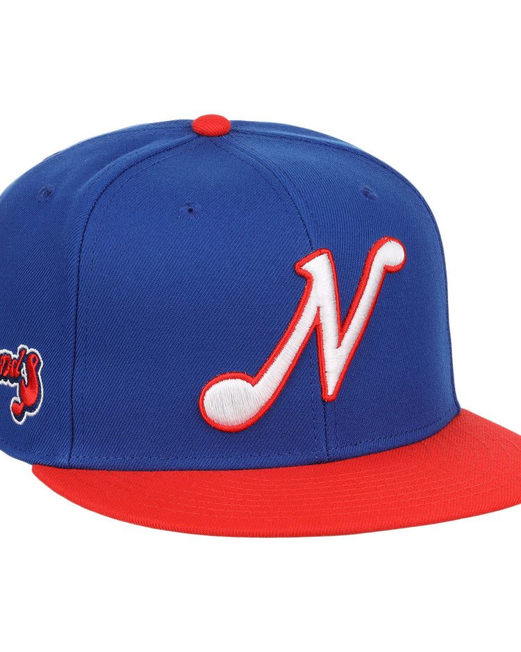 The Nashville Sounds EFF MiLB Vintage Snapback by Ebbets Field Flannels features a blue crown, red brim, 3D ’N’ front logo, and Sounds stitched in red and white script on the side. Part of the Vintage Minor League collection.