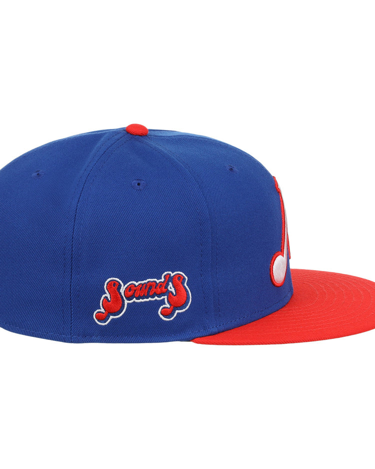 The Nashville Sounds EFF MiLB Vintage Snapback by Ebbets Field Flannels features a blue crown, red brim and button, white musical note front patch, bold 3D ‘N’ logo, and “Sounds” in red/white script on the side.