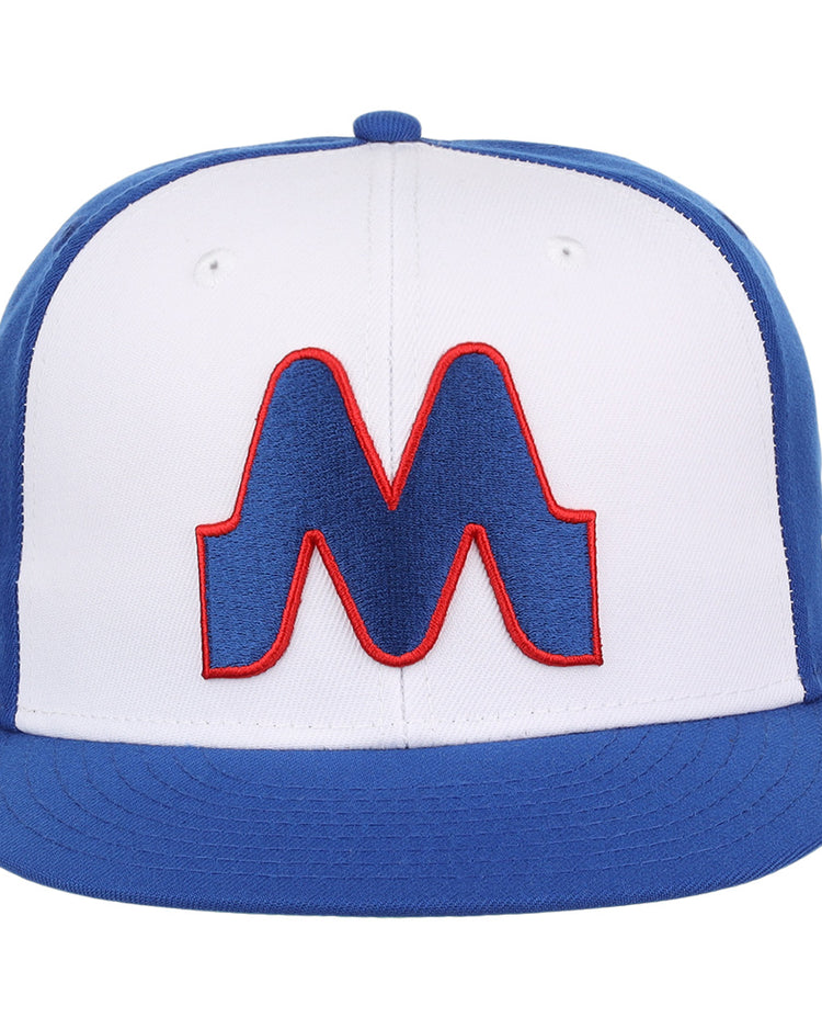 The Memphis Chicks EFF MiLB Vintage Snapback by Ebbets Field Flannels features a blue brim and panels, white front, and a bold blue and red M logo—part of the Vintage Minor League collection with snapback adjustment.
